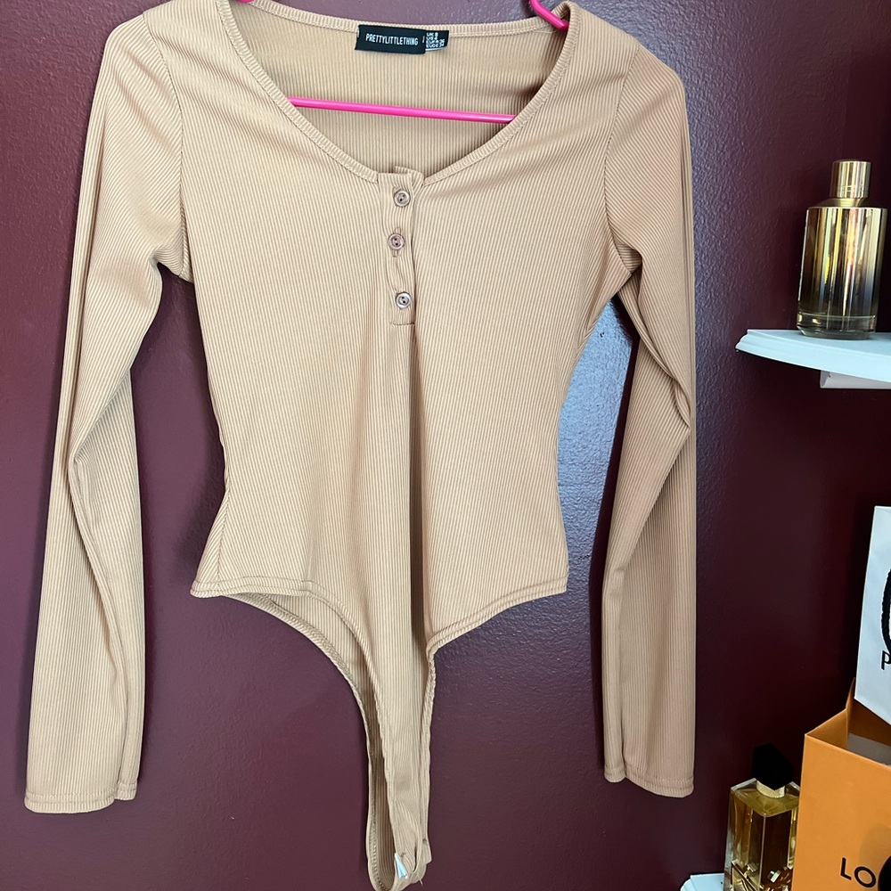 Tan body suit